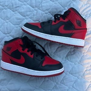 Black and red Jordan 1 Mid. Youth 5.5.